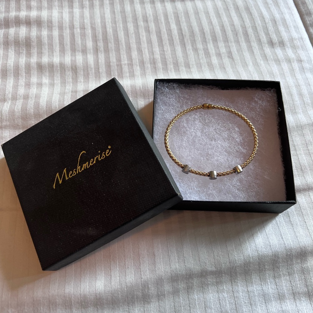 Gold plated silver cuff. Never worn. New in box! Make me an offer :)